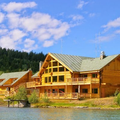 Log lodge buildings above the lakeshore at Chilko Lake